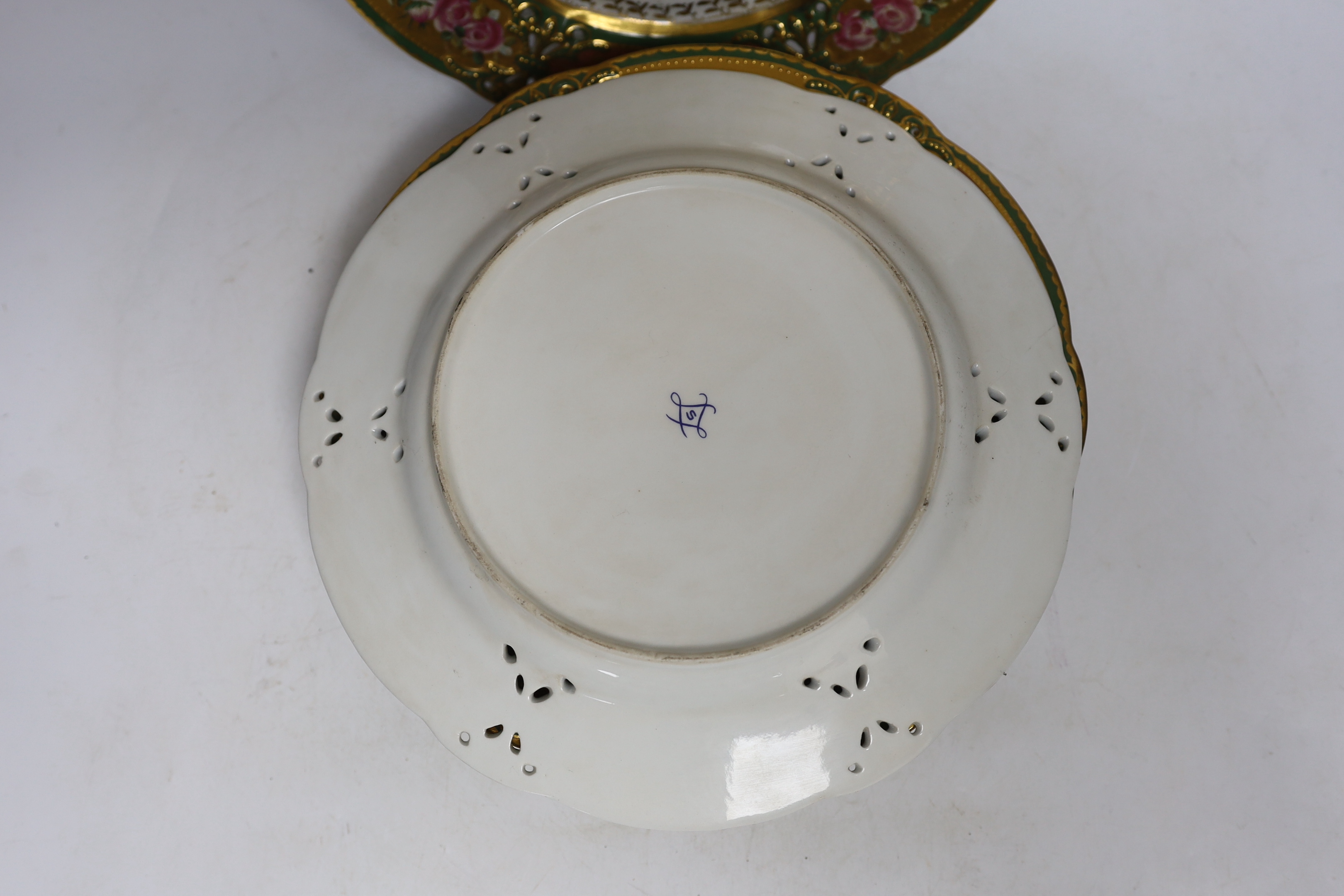 A set of six floral Sevres-style dessert plates